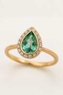 Pear-Shaped Emerald Halo Ring in 18k Gold