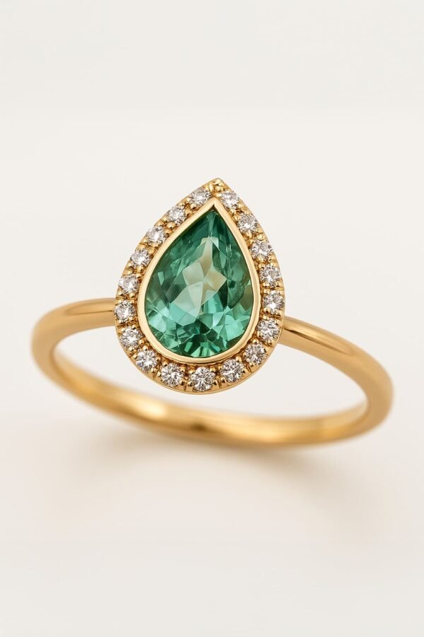 Pear-Shaped Emerald Halo Ring in 18k Gold