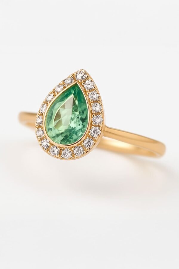 Pear-Shaped Emerald Halo Ring in 18k Gold